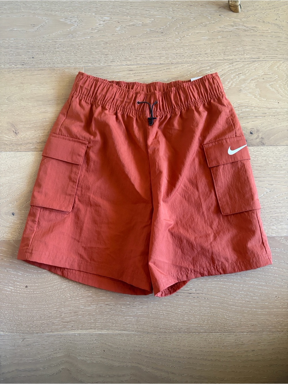 Nike Women’s High-Waist Cargo Shorts — Rust Orange